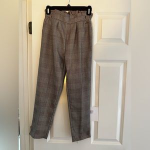 Girls Mayoral plaid pants with elastic waistband and belt loops.